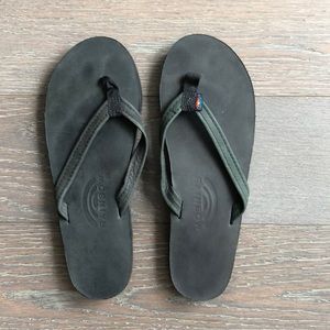 RAINBOW black leather flip flops